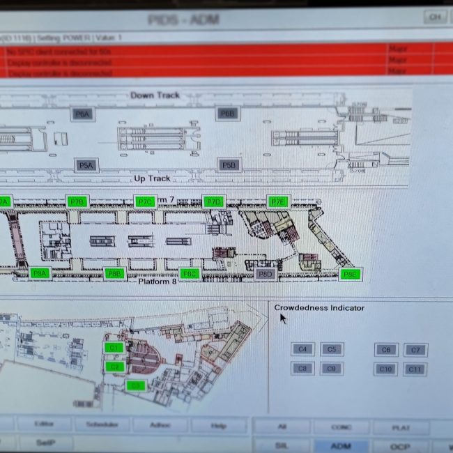 The back end view of the screens and signals at platforms and concourse.